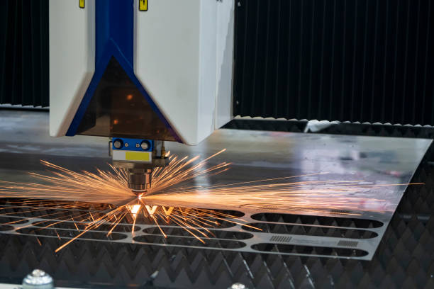 istock The fiber laser cutting machine control by CNC program system. The hi-technology sheet metal manufacturing process by l 1193830849