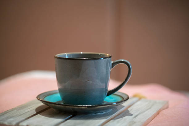 istock coffee cup on wooden tray 1193833833