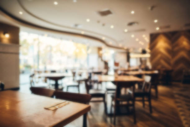 istock Blur restaurant with abstract bokeh light image background. For create montage product display 1193838893