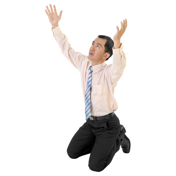 istock Mature business man begging 119384004