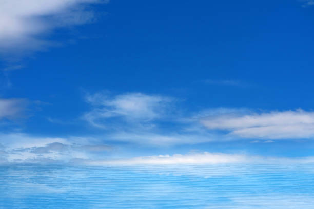 istock reflection white pure heap cloud sunshine in the blue sky and sunlight on sea surface 1193842951