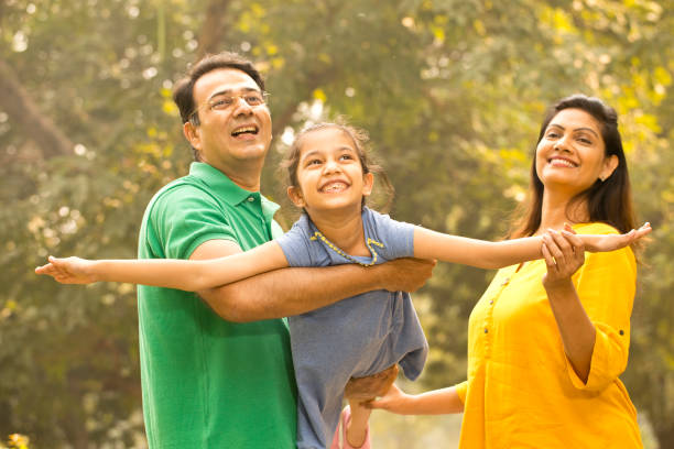 istock Family having fun at park 1193844388