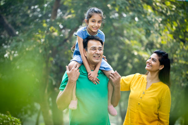 istock Happy family at park 1193844455