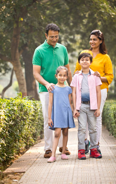 istock Happy family at park 1193846131