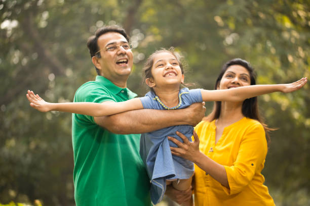 istock Family having fun at park 1193846848