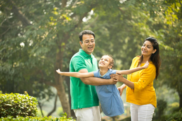 istock Family having fun at park 1193846870