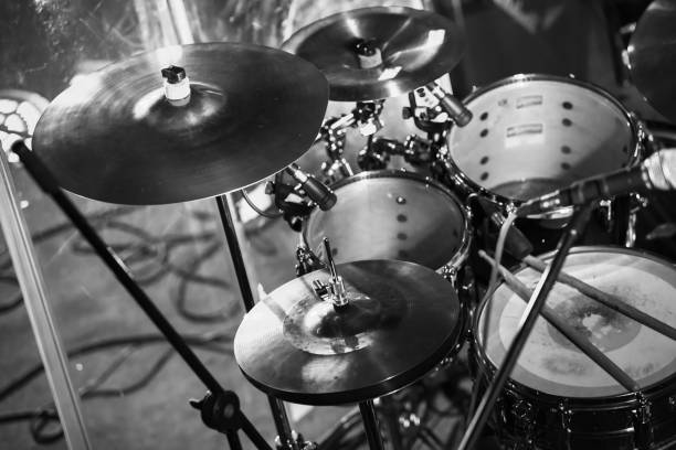 Rock band drum set in purple stage lights