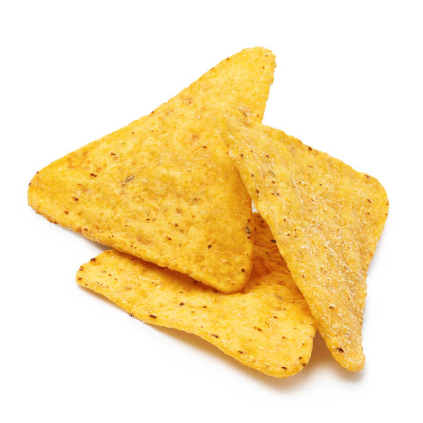 начос чипсы на белом - nachos yellow white spice стоковые фото и изображения