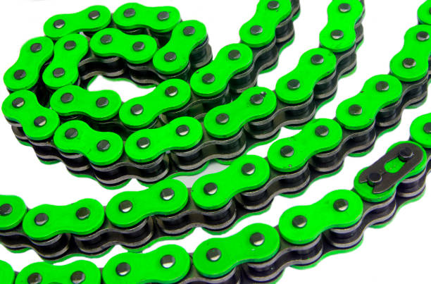 green motorcycle chain on a white background stock photo