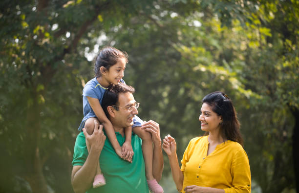 istock Happy family at park 1193848762