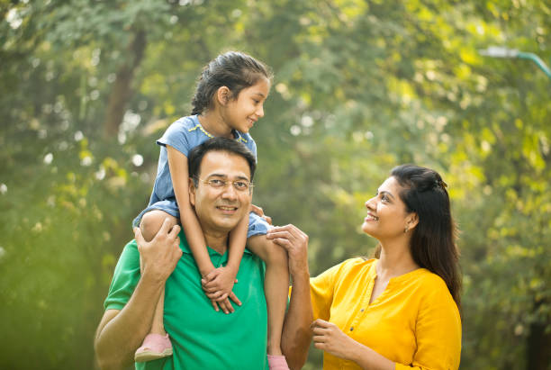 istock Happy family at park 1193848770