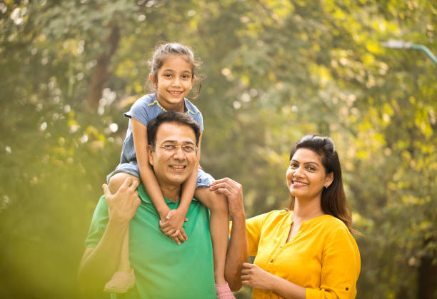 istock Happy family at park 1193848786