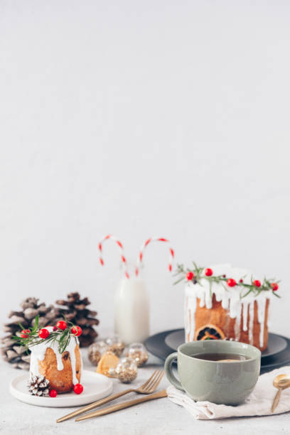 istock Traditional Christmas cake with cranberry, hot tea 1193861712