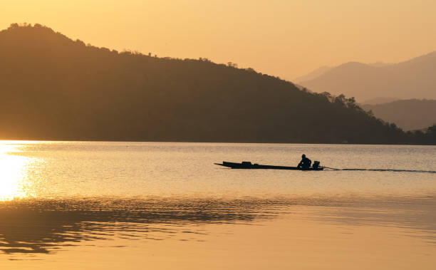 istock Sunset sunrise over river and mountain 1193863922