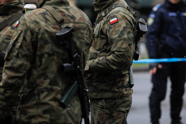 Polish soldiers take part at the Romanian National Day military parade. Bucharest, Romania - December 01, 2019: Polish soldiers take part at the Romanian National Day military parade. poland stock pictures, royalty-free photos & images