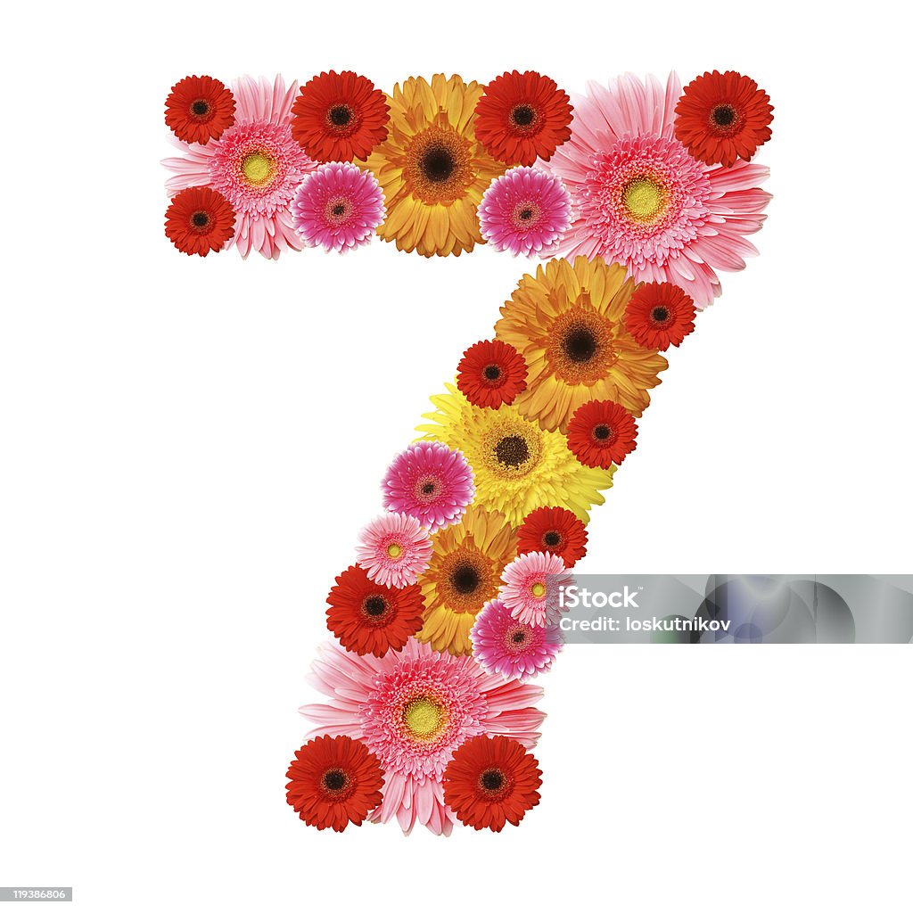 Number 7 composed of pink and yellow daisies 7, arabic numeral Beauty In Nature Stock Photo