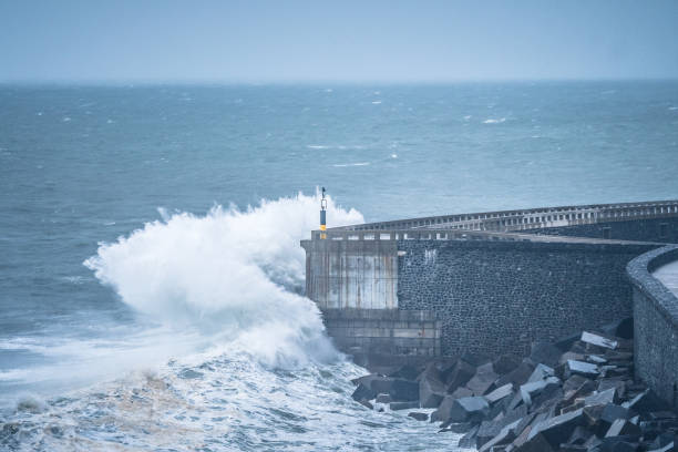 istock big waves are breaking furious at coastal shore 1193868805