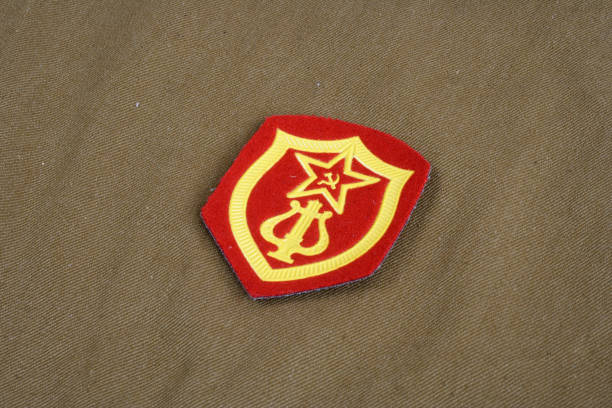 istock Soviet Army Military Orchestra Service shoulder patch on khaki uniform background 1193872390