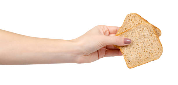 istock Whole wheat bread, healthy food. Isolated on white. 1193875811