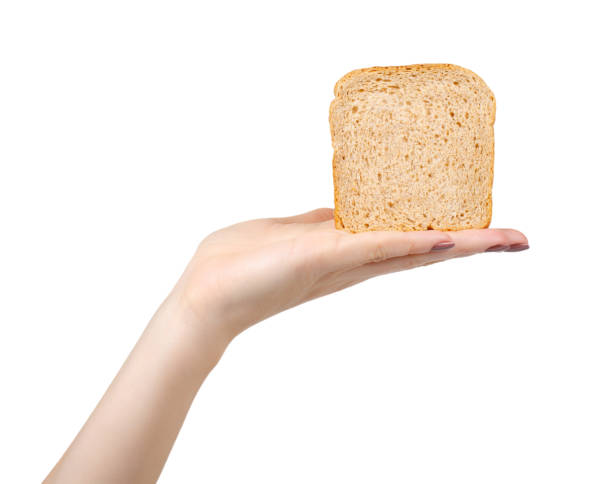 istock Whole wheat bread, healthy food. Isolated on white. 1193875817