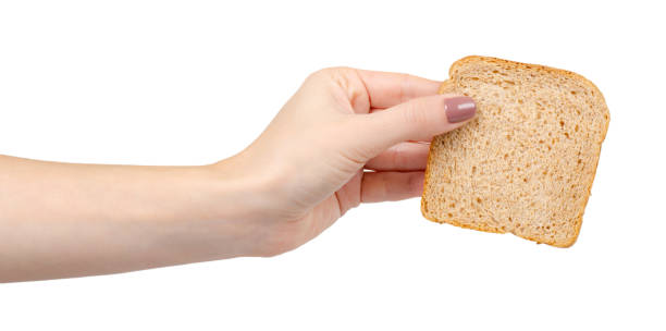 istock Whole wheat bread, healthy food. Isolated on white. 1193875825