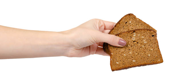 istock Brown bread with seeds, heathy food. Isolated on white. 1193875835