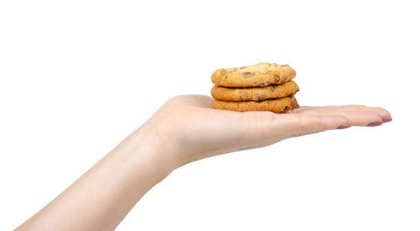 istock Round cookie with chocolate drops. Isolated on white. 1193875918