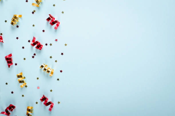 istock Colored confetti composition on blue background, party and celebration decoration. 1193876902