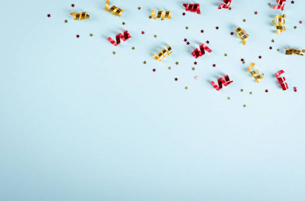 istock Colored confetti composition on blue background, party and celebration decoration. 1193876915
