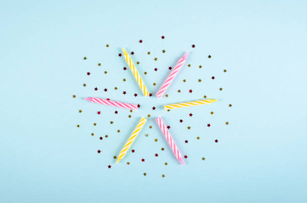 istock Colored candles composition on blue background, party and celebration decoration. 1193877039