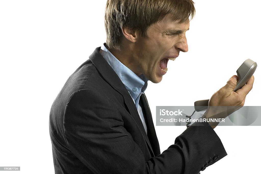 Angry business man on the phone  Conference Phone Stock Photo