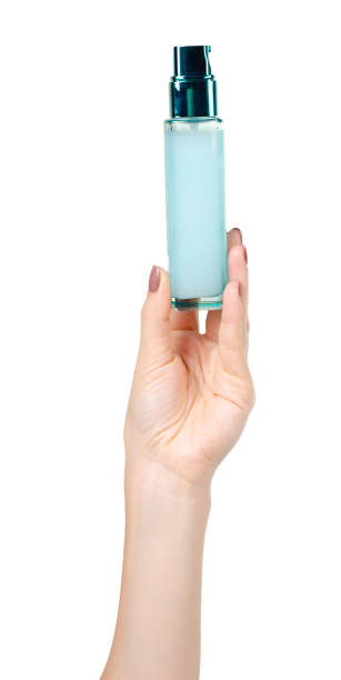 istock Face cream in glass bottle with dispencer. Blue container. 1193878135