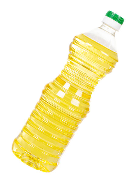 Pure sunflower oil in plastic bottle. Seasoning for salads. stock photo
