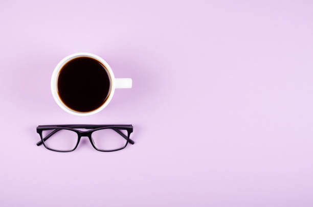 istock Coffee cup composition on purple background. Flat lay. 1193879001