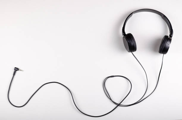 istock Black headphones composition on gray background. Flat lay. 1193879564