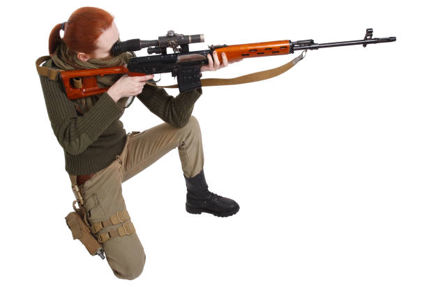 istock woman sniper with SVD sniper rifle 1193879596