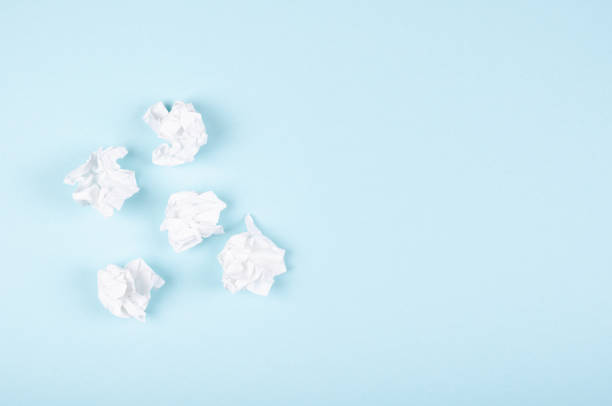 istock Crumpled paper composition on blue background. Flat lay. 1193879908