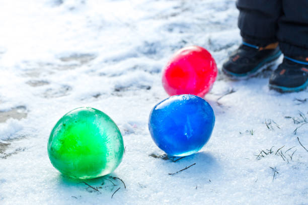 istock child plays a frozen ball 1193879924