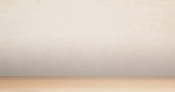 istock Empty work desk and clean wall for product promotion 1193881406