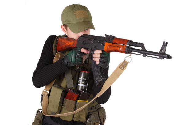 istock mercenary with AK 47 gun 1193882256