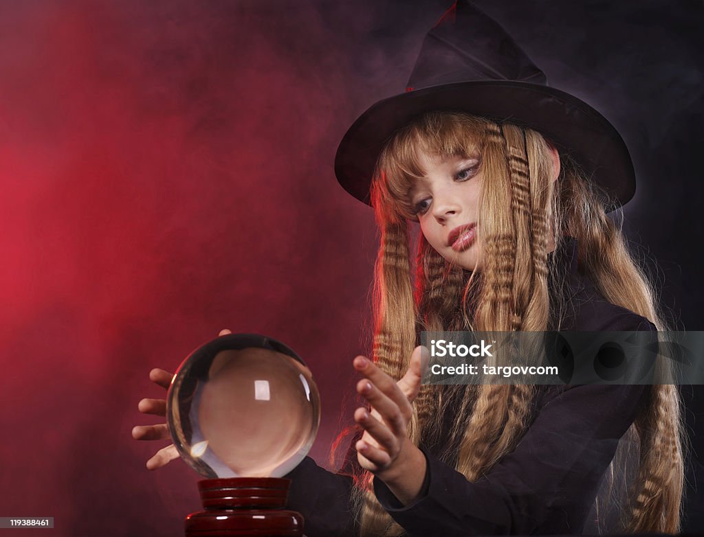 Girl holding crystal ball.  Child Stock Photo