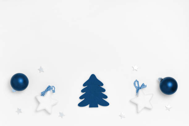 istock New Year and Christmas composition. Frame on white background. Top view, flat lay, copy space. Trendy color of the year 2020. 1193892073