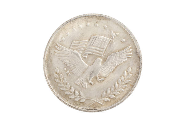 istock old vintage silver dollar isolated on background 1193893518
