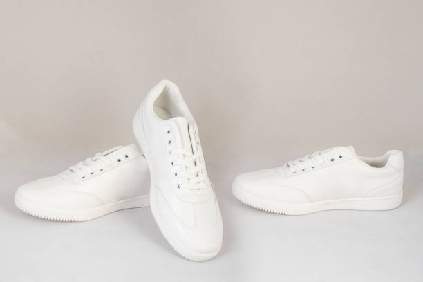 istock white sneakers shoes isolated on white background side and front view 1193894287