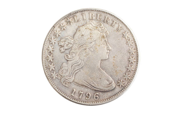 istock old vintage silver dollar isolated on background 1193894315