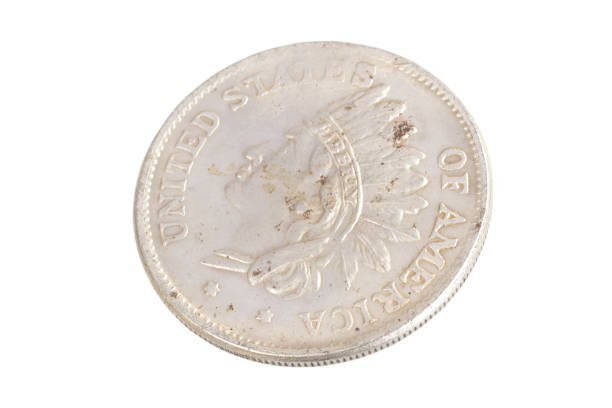 istock old vintage silver dollar isolated on background 1193894409