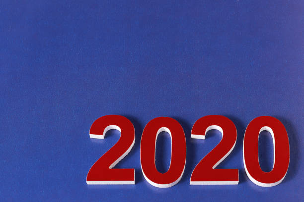istock Red numbers 2020 on a blue background, blank for a postcard to the designer. copy space 1193897926