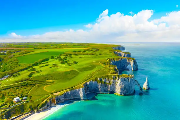 Photo of Picturesque panoramic landscape on the cliffs of Etretat. Natural amazing cliffs. Etretat, Normandy, France, La Manche or English Channel. Coast of the Pays de Caux area in sunny summer day. France