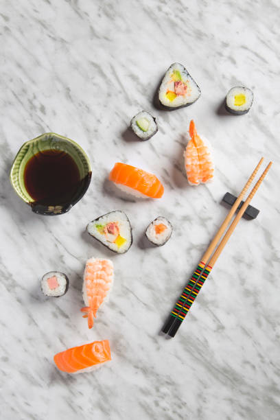 istock Closeup sushi composition on marble background top view. 1193900557