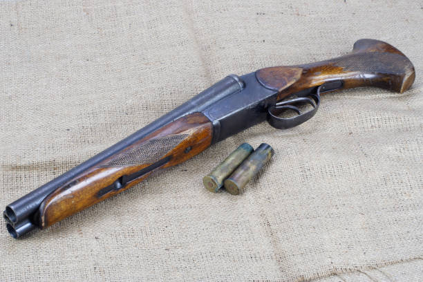 istock Sawn-off shotgun with cartridges 1193903486
